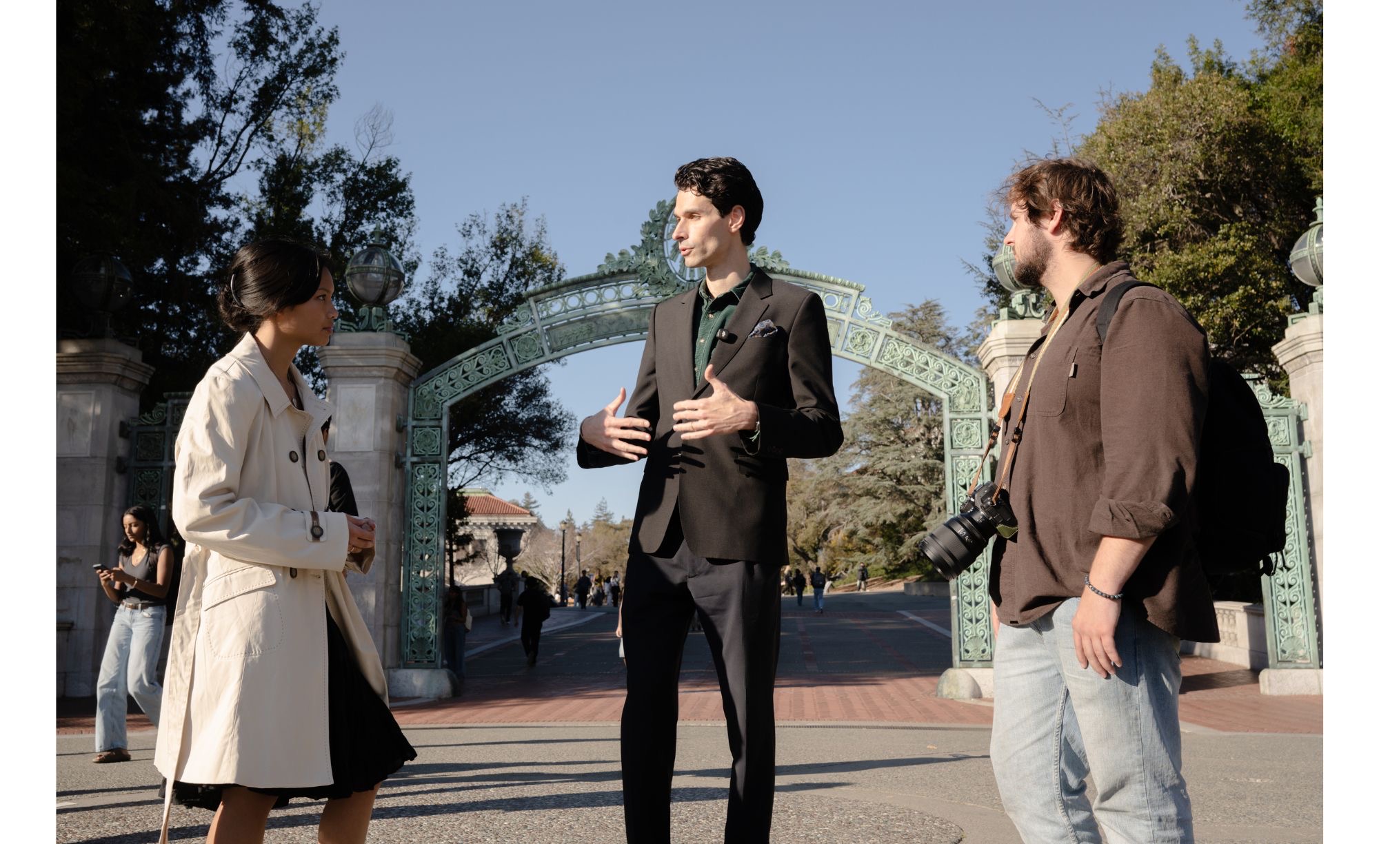 Matthew Chase Levy speaking with people at UC Berkeley's Sather Gate